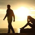 Couple,Silhouette,Breaking,Up,A,Relation,On,The,Beach,At